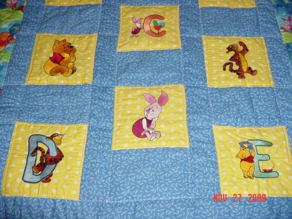 Quilt with Winnie Pooh free machine embroidery designs