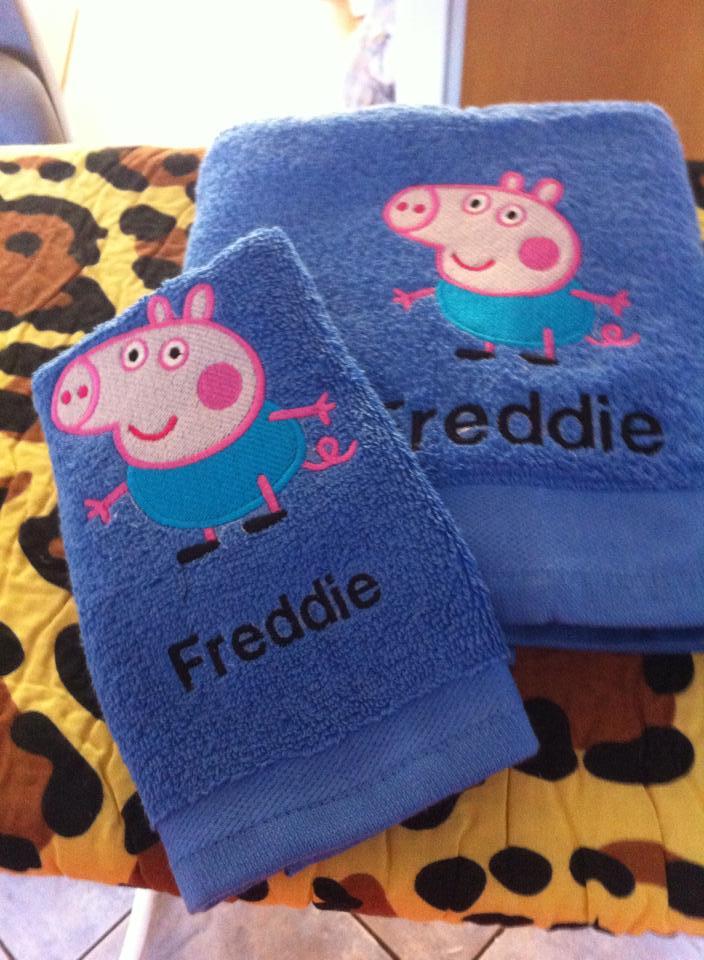 Embroidered Peppa Pig design at towel