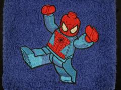Towel with embroidered Lego Spiderman design