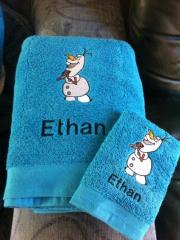 Embroidered Olaf design at towel