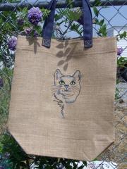 Embroidered bag with cat's portrait
