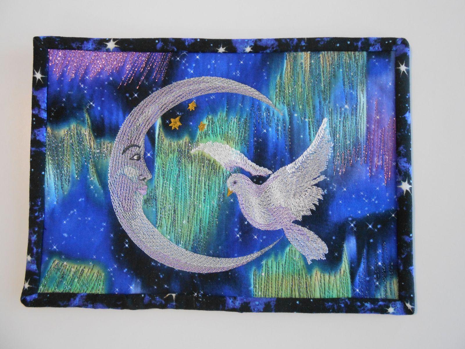 Quilt with Crescent Dove Art free design in machine embroidery