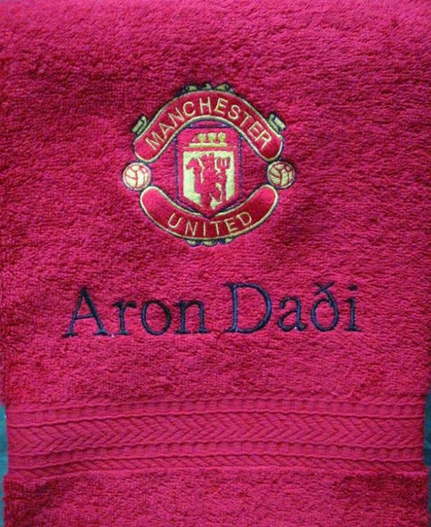 Embroidered towel with Manchester logo design