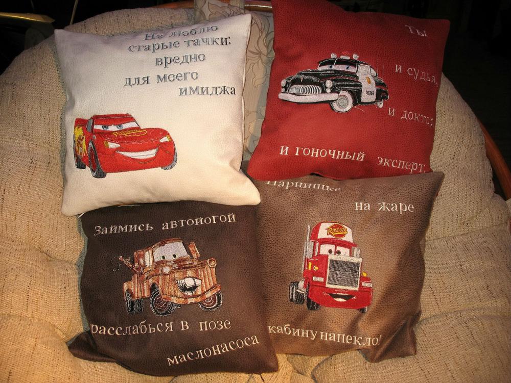 Embroidered cushion with cars designs