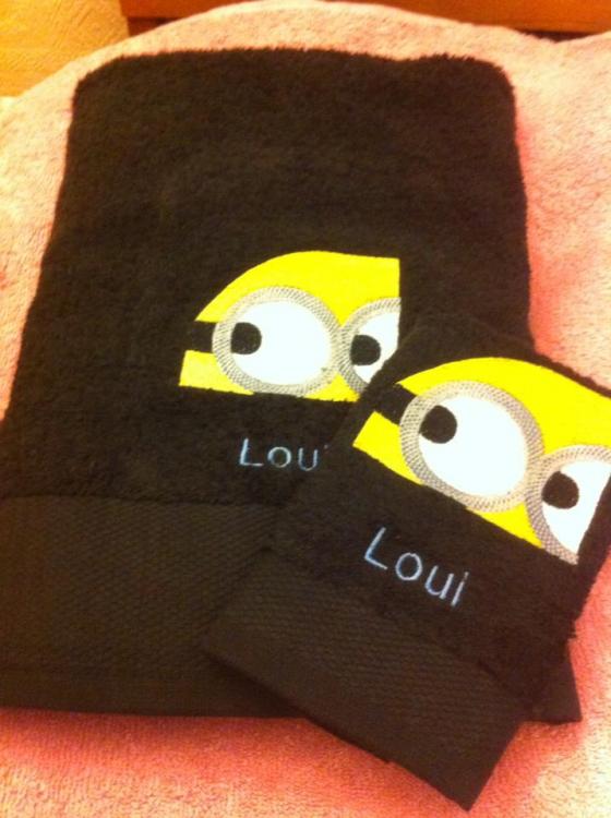 Towel with Minions embroidery designs