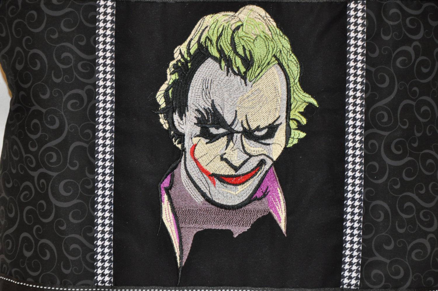 Pillow with Joker embrodiery design