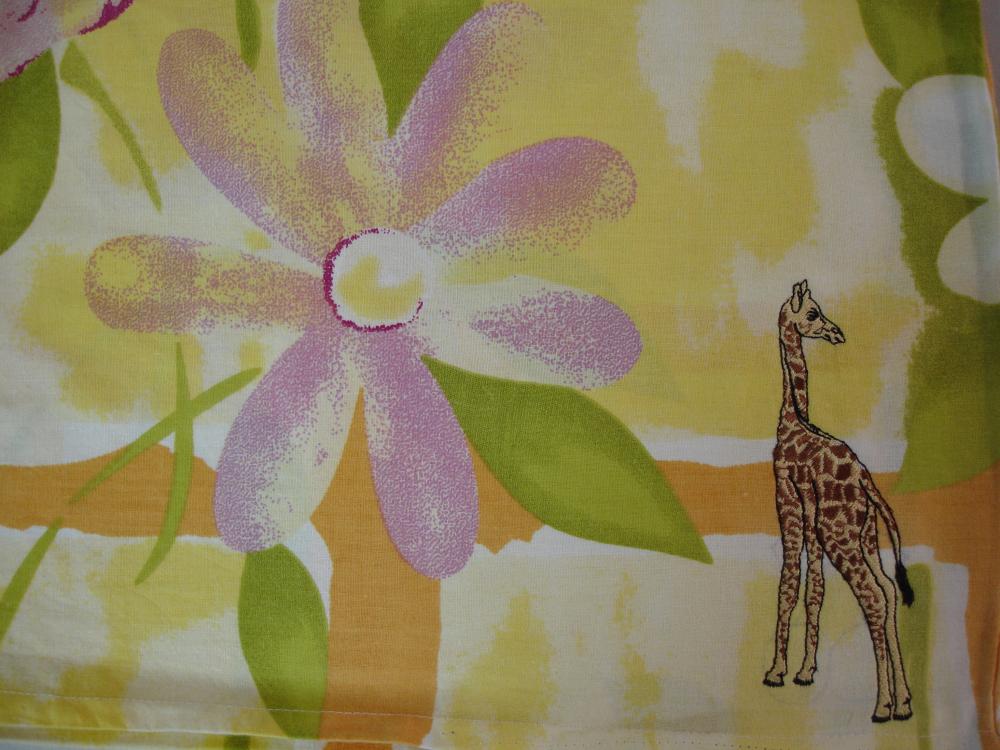 Pillow with giraffe free embroidery design