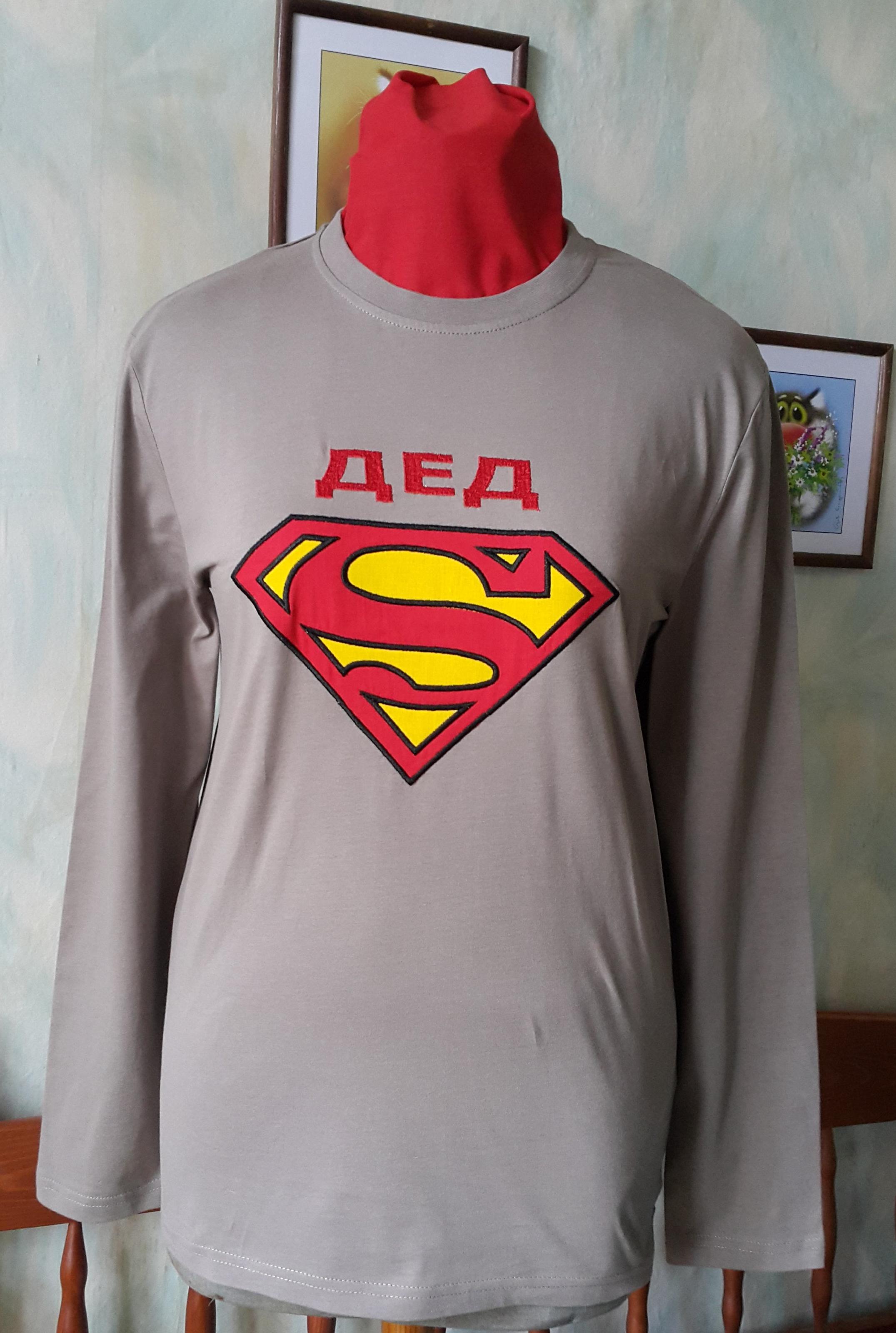 A long sleeve T-shirt with a Superman logo embroidery design