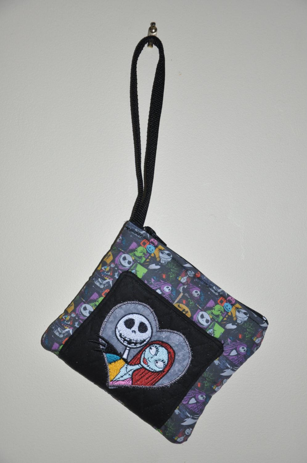 A purse with Jack Skellington and Sally embroidery design