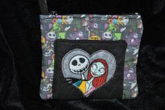A purse with Jack Skellington and Sally design (closer look)