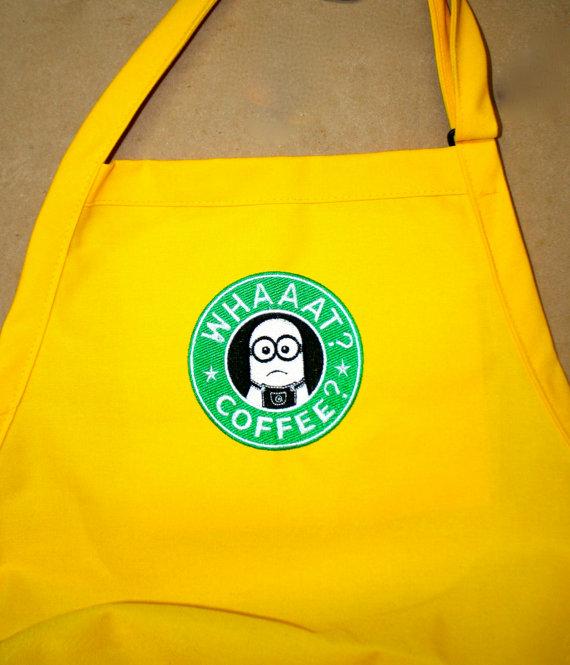 A yellow apron with a Starbucks minion embroidery design