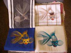 Embroidered towels with gold fish free design