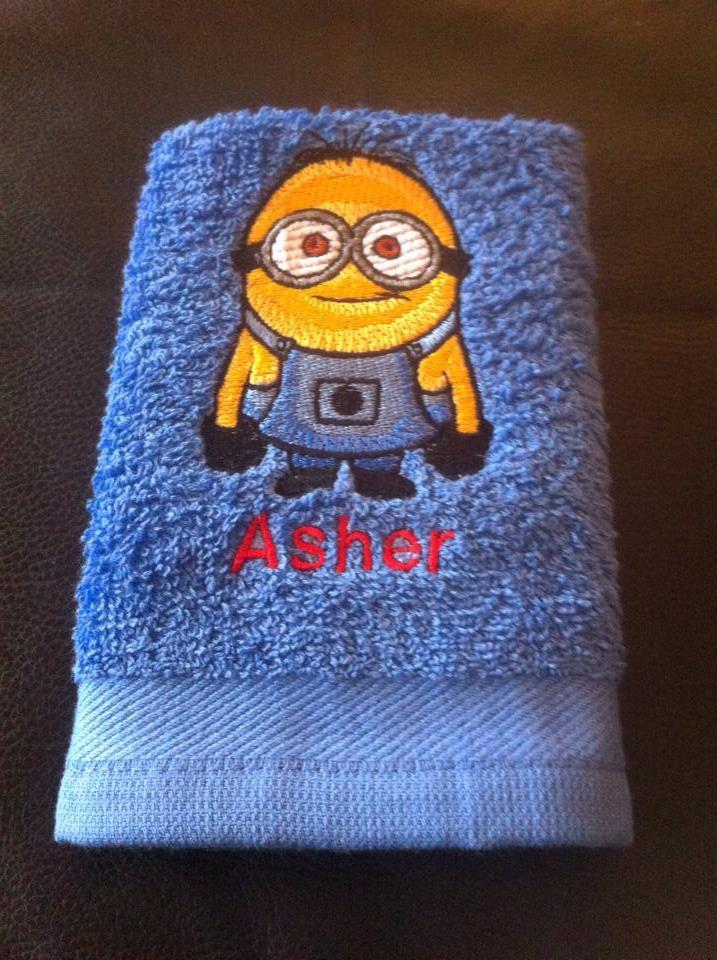 Bath towel with Minion embroidery design