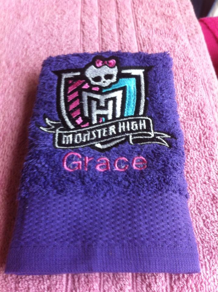 Bath towel with Monster High logo embroidery design