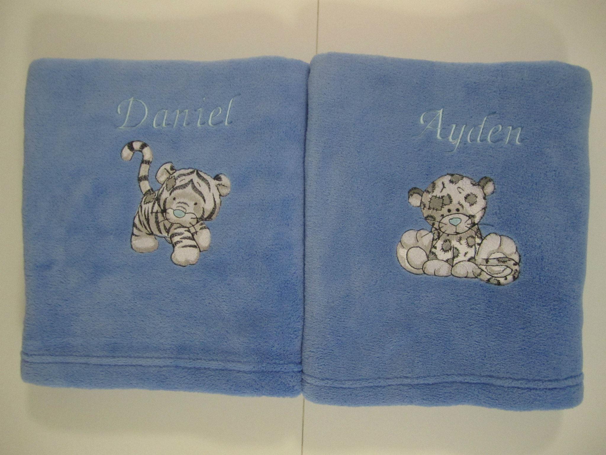 Towel with Leo and Bengal tiger embroidery designs
