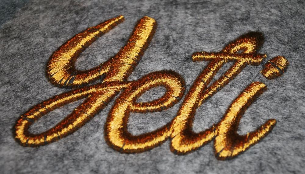Embroidered letters with 3D Puff and mettalic threads Metallic thread on 3d puff