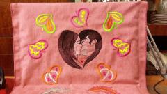 Pillow with kiss free embroidery design