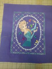 Towel with Elsa stitched design