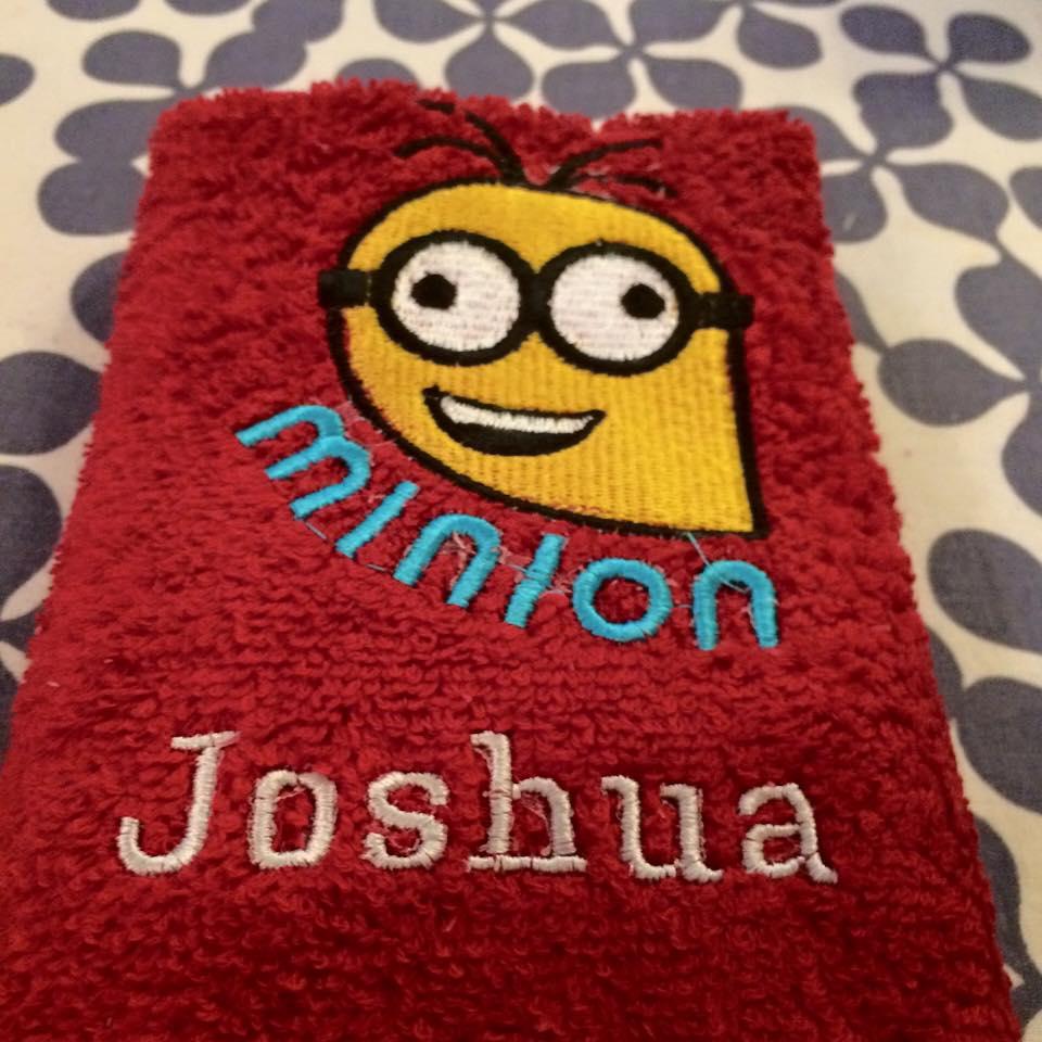 Bathroom towel with Crazy Minion embroidery design
