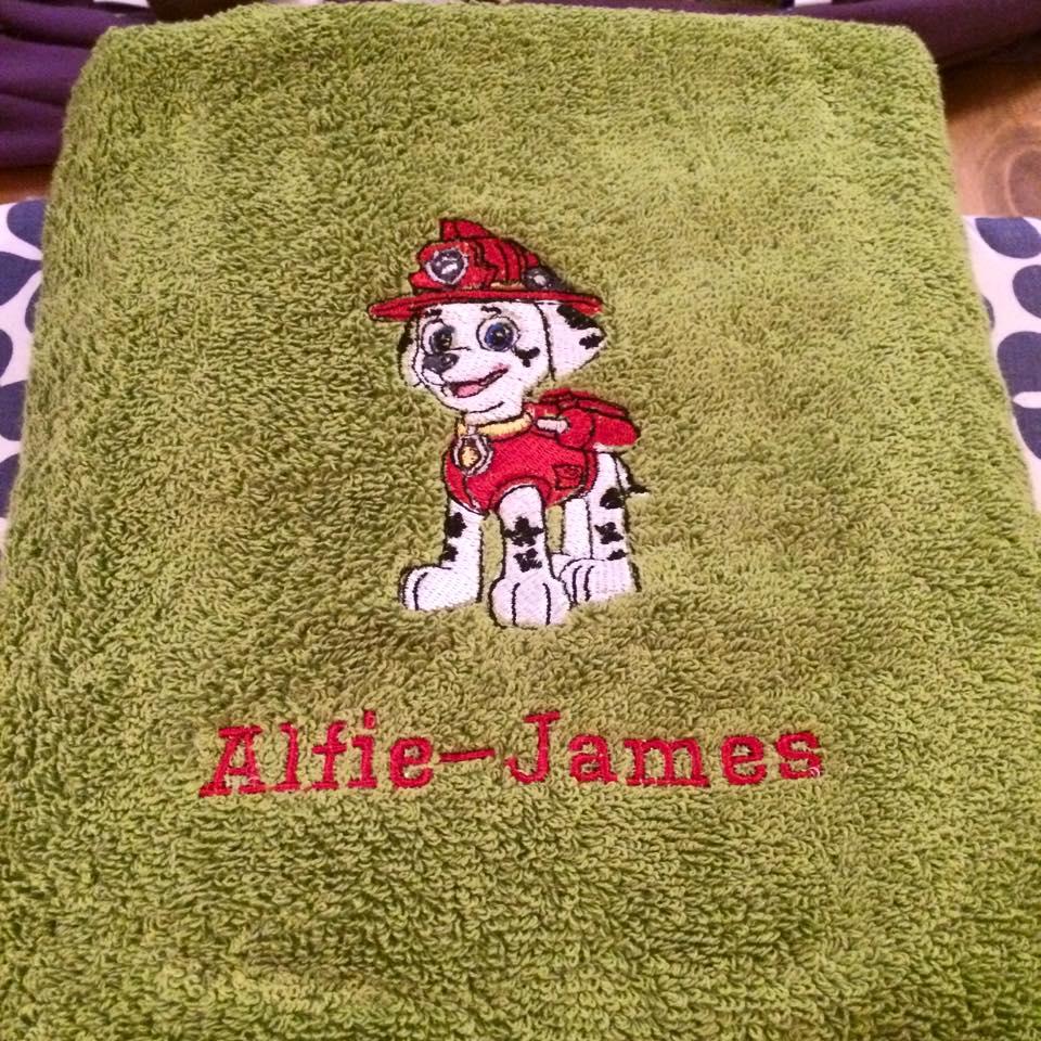 Bath towel with Marshall embroidery design