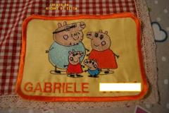 Baby bib with Peppa Pig world embroidery design