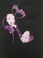 Shoes on a high heel decorated with orchid embroidery design