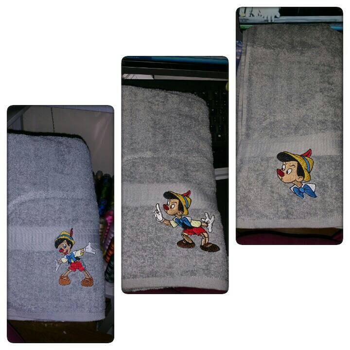 Towels with Pinocchio embroidery designs