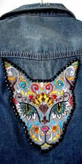 Denim jacket with Mexican cat embroidery design