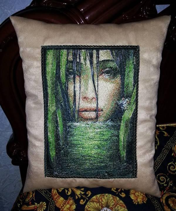 Pillow with strange lady free embroidery design