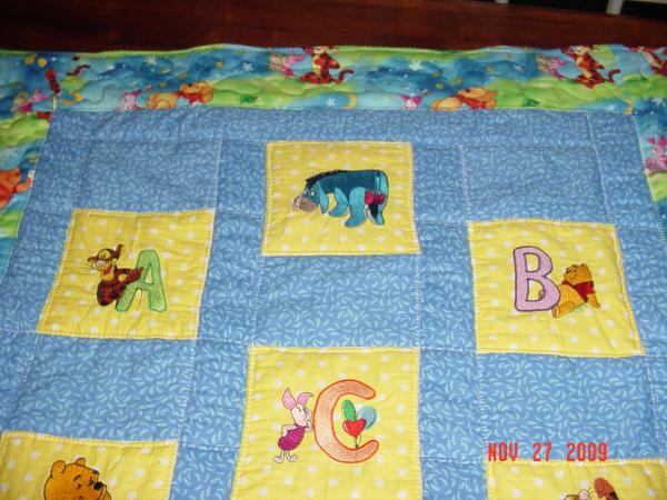 Baby blanket ith Winnie the Pooh and friends free machine embroidery designs