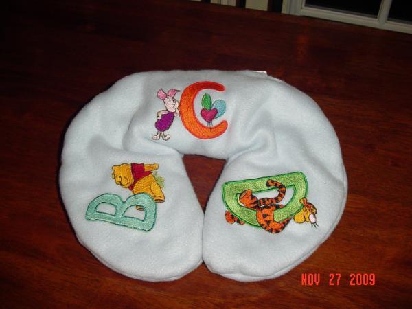 Pillow with Winnie-the-Pooh and friends machine embroidery designs