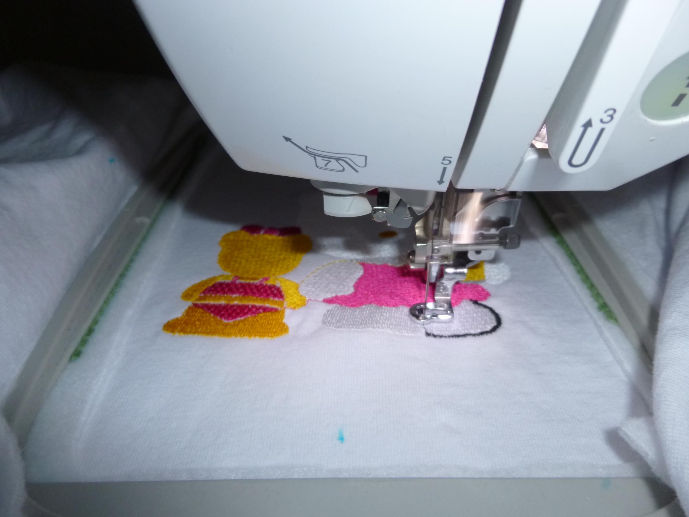 Embroidery process with Hello Kitty We are Friends design