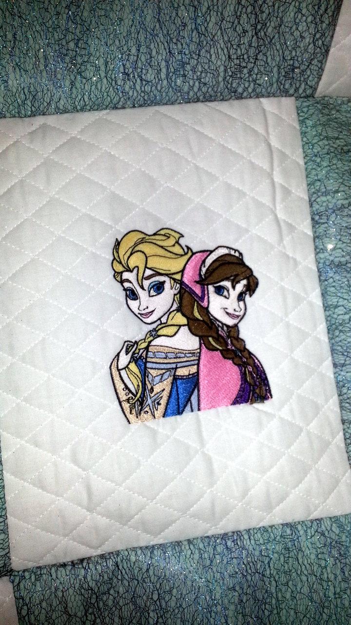 Bed cover with Frozen sisters embroidery design