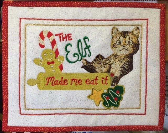 Christmas carpet with cat free embroidery design