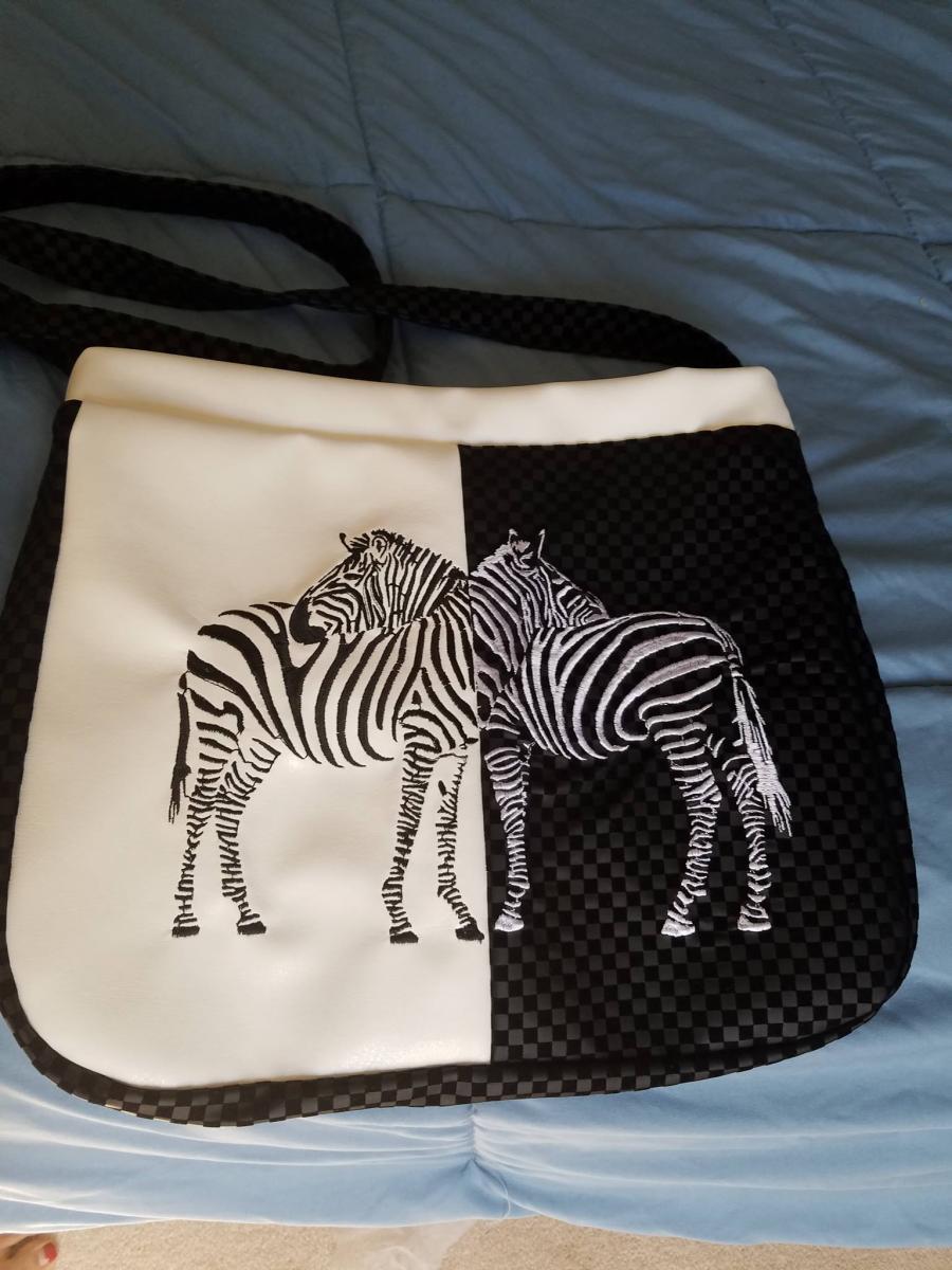 Bag embroidered with two zebra free design