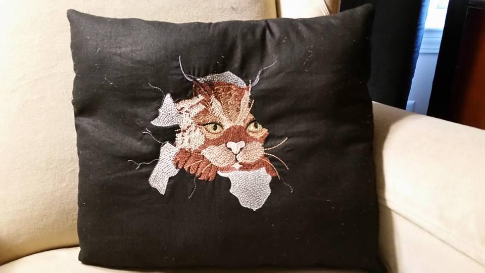 Embroidered pillow with angry cat free design
