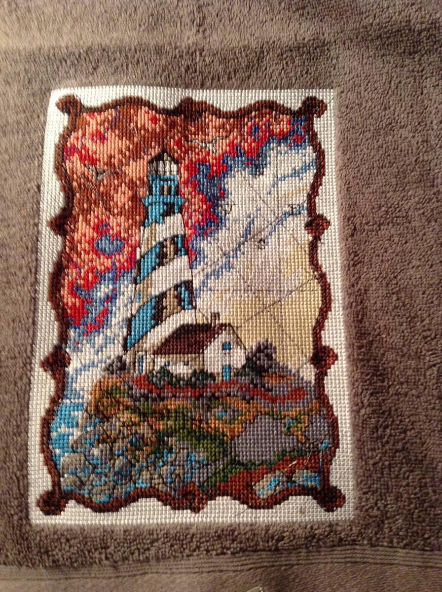 Towel with lighthouse cross stitch free embroidery design