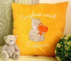 Orange pillow with Teddy Bear with a pillow heart machine embroidery design