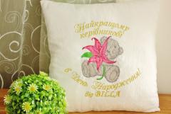 White pillow with Teddy Bear with lily embroidery design