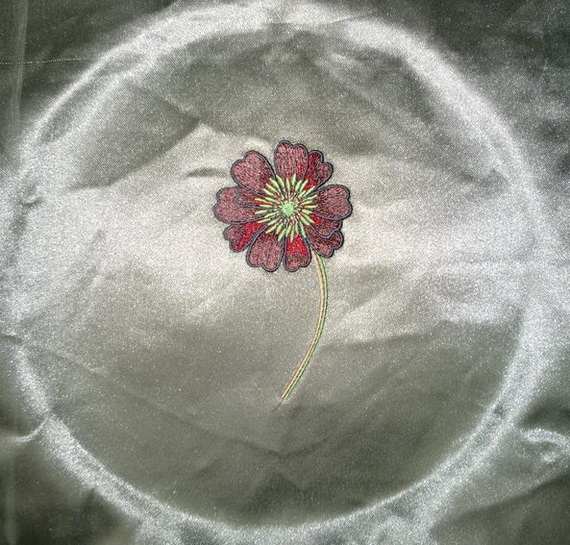 Embroidered flower with sation stitches