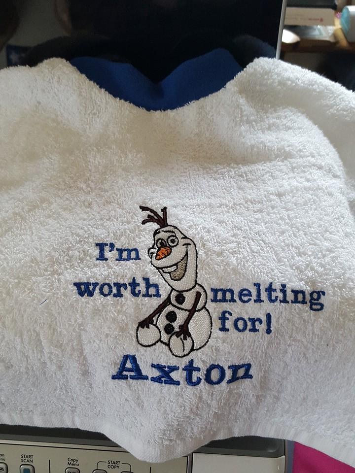 Towel with Happy Olaf embroidery design