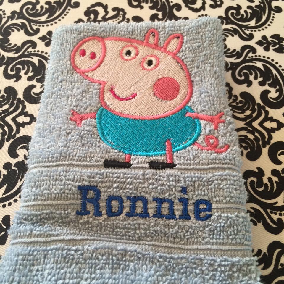 Bath towel with Peppa Pig embroidery design