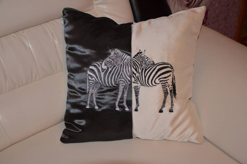 Cushion with zebra free embroidery design