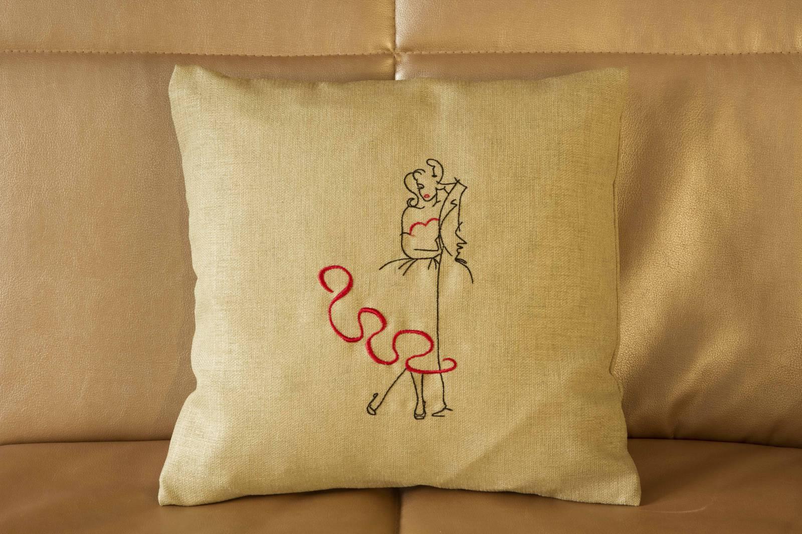 Embroidered cushion with together free design