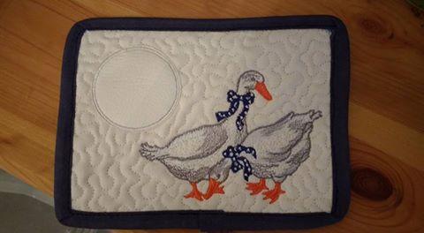 Kitchen napkin with two geese free embroidery design