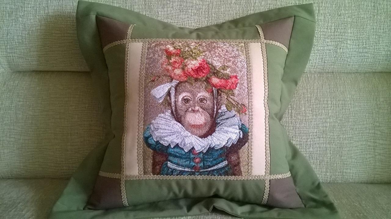 Embroidered cushion with monkey photo stitch free embroidery design