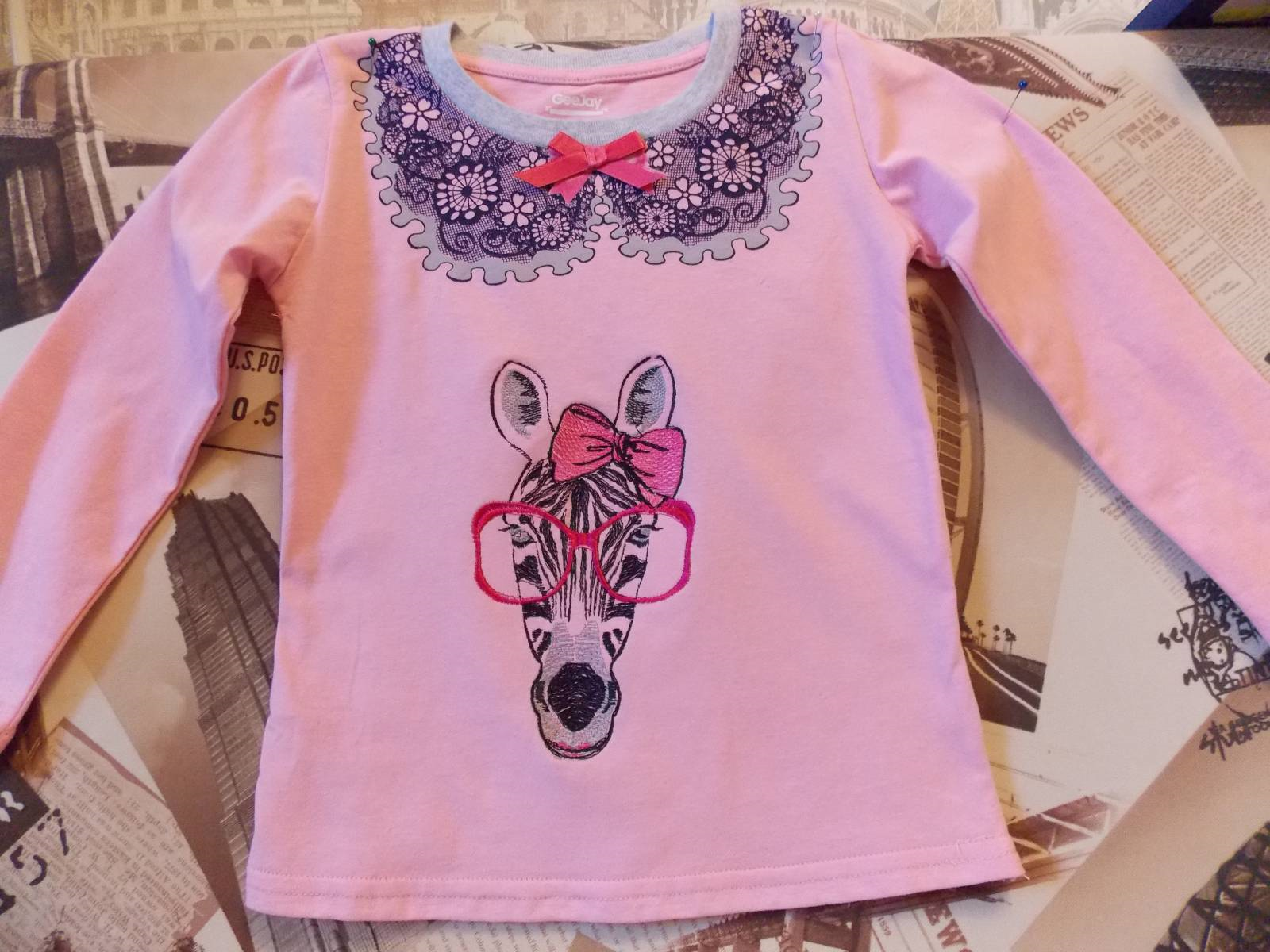 Girl's shirt with zebra free embroidery design