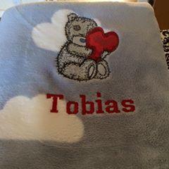Napkin withTeddy Bear with a pillow heart machine embroidery design
