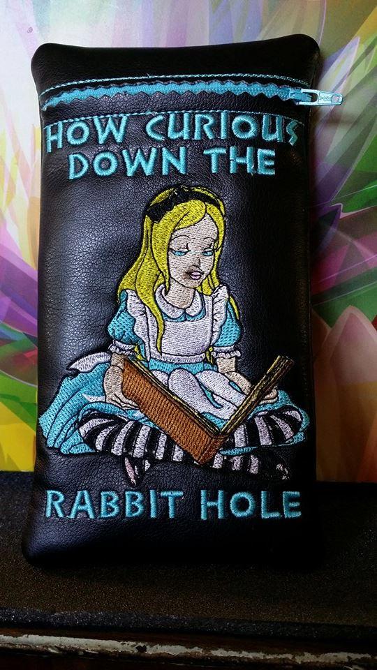 Small case with Alice reading embroidery design