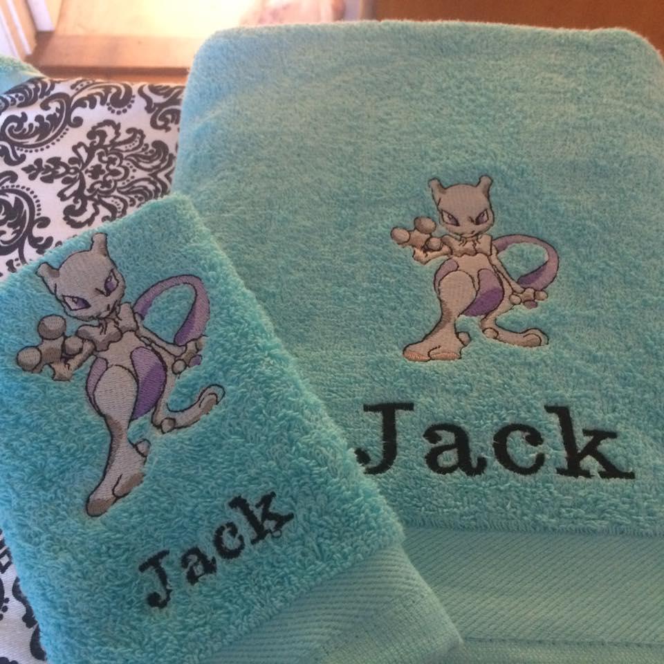 Towel with Mewtwo embroidery design